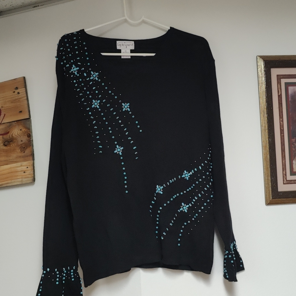 Black sweater with turquoise embellishments
